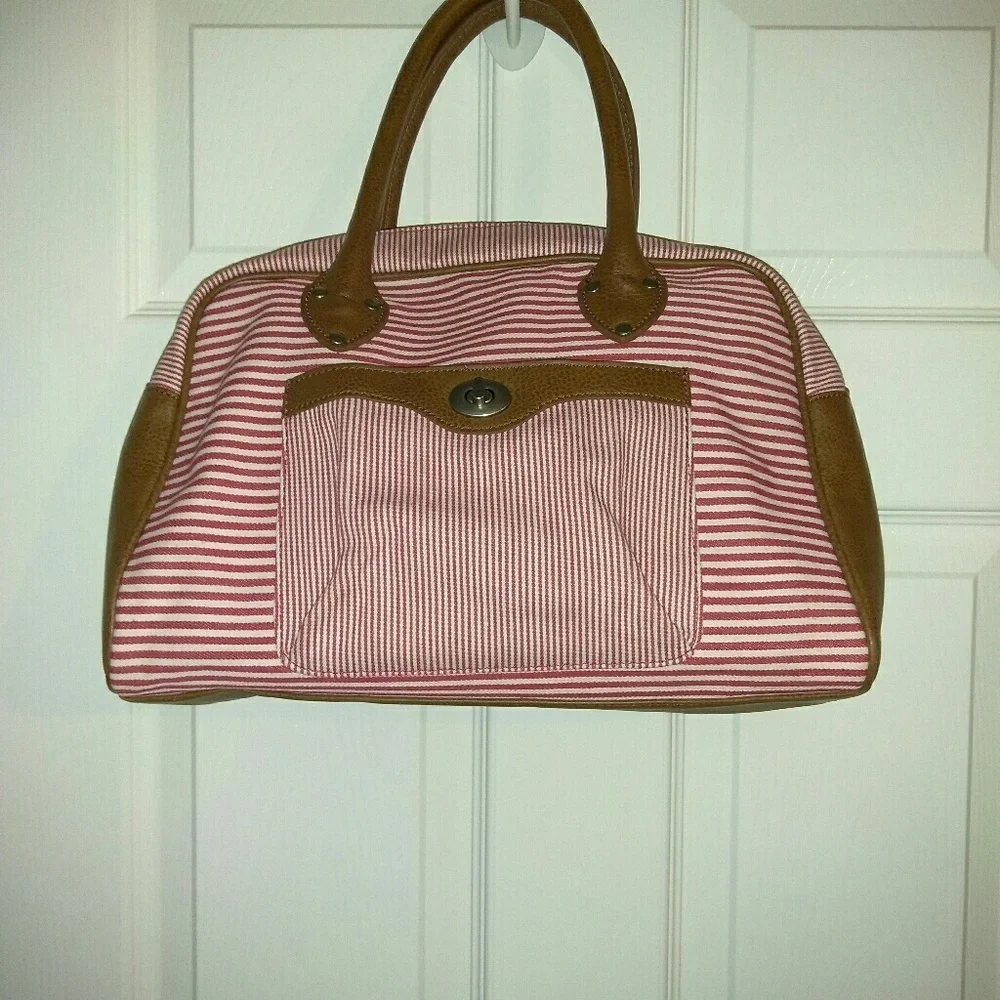 Red and white striped hand bag